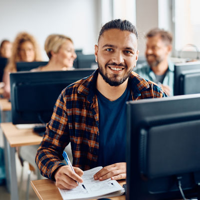 Man behind pc in examsetting Man behind pc in examsetting